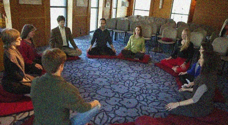 Group meditation circle people
